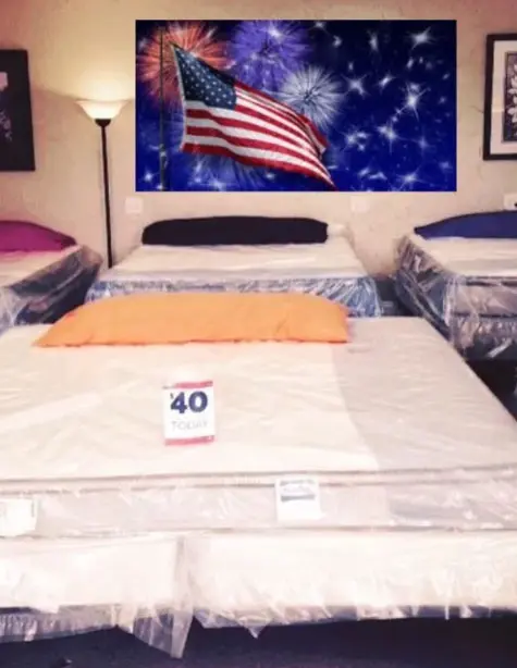 White mattress with pillow at store