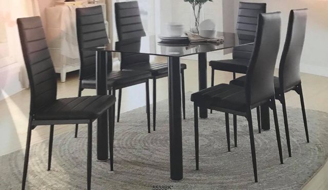 Black colored Dining Table and chairs