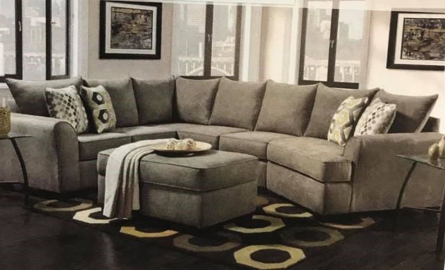 A gray, long sofa